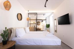 Postel nebo postele na pokoji v ubytování Petra Luxury Suites