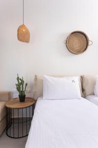 Postel nebo postele na pokoji v ubytování Petra Luxury Suites