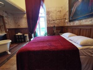 Posteľ alebo postele v izbe v ubytovaní Laitse castle