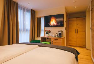 Postel nebo postele na pokoji v ubytování Hotel Tannenhof