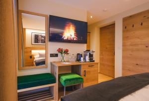 Postel nebo postele na pokoji v ubytování Hotel Tannenhof