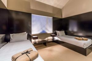 Letto o letti in una camera di Club Wyndham Dinner Plain, Trademark Collection by Wyndham