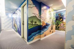 Postel nebo postele na pokoji v ubytování Morwing Hotel - Ocean