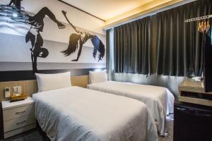 Postel nebo postele na pokoji v ubytování Morwing Hotel - Ocean