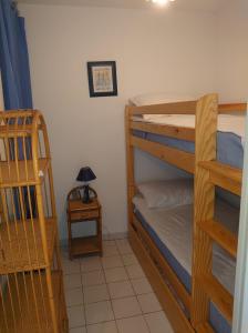 Posteľ alebo postele v izbe v ubytovaní 4RB86 Appartement type T2 cabine dans résidence bord de mer à Collioure
