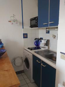 Kuchyňa alebo kuchynka v ubytovaní 4RB86 Appartement type T2 cabine dans résidence bord de mer à Collioure