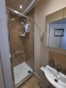 Koupelna v ubytování Greenlands Guest House + 10 fotografií