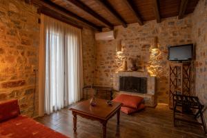 TV a/nebo společenská místnost v ubytování Guesthouse Laoula + 37 fotografií
