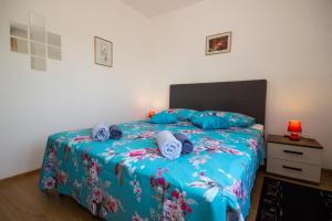 Postel nebo postele na pokoji v ubytování Apartment Jenny with parking, Wi-Fi and sea view