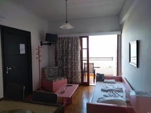 Posedenie v ubytovaní Ostria Apartments Kalives
