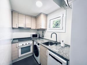 Kuchyňa alebo kuchynka v ubytovaní ZEN Apartment sea views