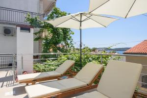 Balkón nebo terasa v ubytování A3-90m2 apt w shared pool & balcony next to beach