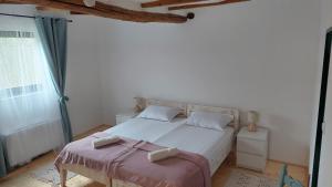 Postel nebo postele na pokoji v ubytování EVA HOUSE