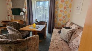 Posezení v ubytování Hotel Heilbrunnen