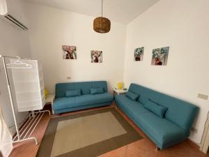 A seating area at Casa vacanze Baglio Barcellona Mondello