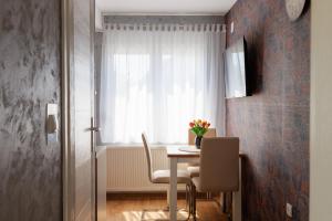 TV a/nebo společenská místnost v ubytování Apartmani Nina