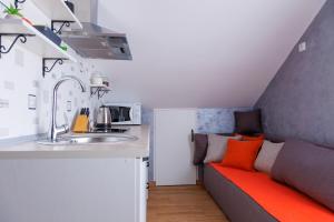 Kuchyň nebo kuchyňský kout v ubytování Apartmani Nina
