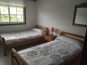 Postel nebo postele na pokoji v ubytování Apartamento fontiñas Sanxenxo montalvo