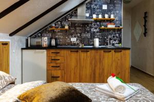 Postel nebo postele na pokoji v ubytování Apartmani Nina