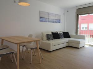 Posedenie v ubytovaní Precioso apartamento familiar con aparcamiento