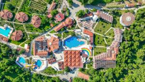 an overhead view of a mansion with a pool at Lykia Botanika Beach Fun & Club - All Inclusive in Fethiye