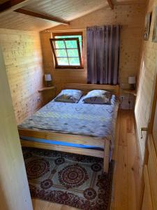 Postel nebo postele na pokoji v ubytování Chalet rustique, 3pièces, jusqu'à 6 personnes