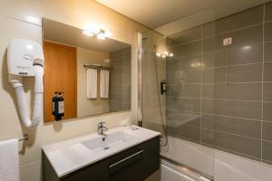 Koupelna v ubytování Antillia Hotel