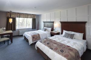 Cama ou camas em um quarto em Auberge Matha