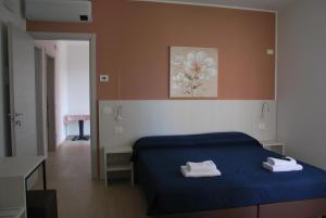 Postel nebo postele na pokoji v ubytování B&B da Rosy