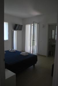 Postel nebo postele na pokoji v ubytování B&B da Rosy
