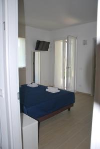 Postel nebo postele na pokoji v ubytování B&B da Rosy