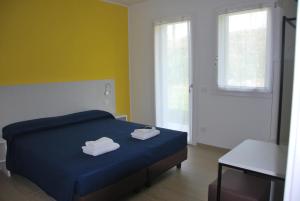 Postel nebo postele na pokoji v ubytování B&B da Rosy