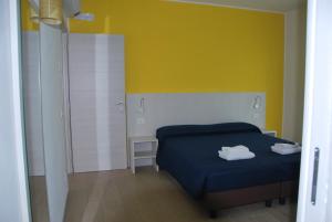 Postel nebo postele na pokoji v ubytování B&B da Rosy