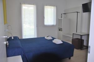 Postel nebo postele na pokoji v ubytování B&B da Rosy