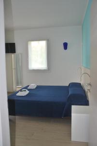 Postel nebo postele na pokoji v ubytování B&B da Rosy