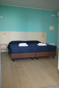 Postel nebo postele na pokoji v ubytování B&B da Rosy
