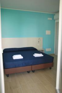 Postel nebo postele na pokoji v ubytování B&B da Rosy