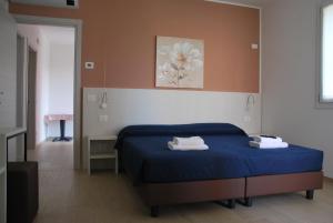 Postel nebo postele na pokoji v ubytování B&B da Rosy