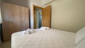Łóżko lub łóżka w pokoju w obiekcie Elena apartment chalkidiki