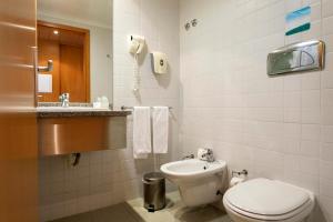 Koupelna v ubytování Antillia Hotel