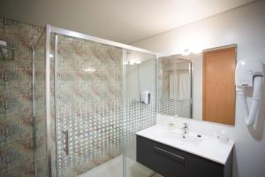 Koupelna v ubytování Antillia Hotel