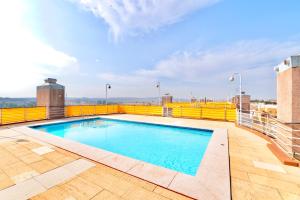 The swimming pool at or close to Swimming pool apartment with private parking