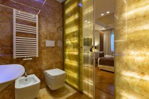 Et badeværelse på Luxury B&B Villetta Carra City - Gallipoli