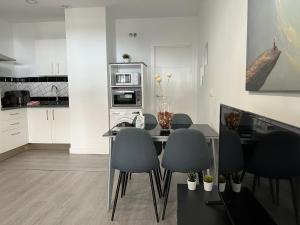 Kuchyň nebo kuchyňský kout v ubytování Apartamento Los Patios