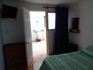 Postel nebo postele na pokoji v ubytování HOSTAL SOL ATACAMA -CALDERA
