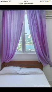 Postel nebo postele na pokoji v ubytování Studio apartmani Rafailovici