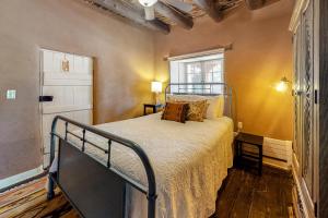 Ένα ή περισσότερα κρεβάτια σε δωμάτιο στο Valerio Adventures Unit 2