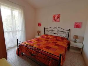 Postel nebo postele na pokoji v ubytování Villa Bianca