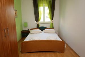 Posteľ alebo postele v izbe v ubytovaní Vila Jasna
