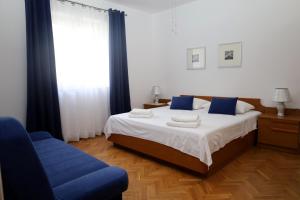 Posteľ alebo postele v izbe v ubytovaní Vila Jasna